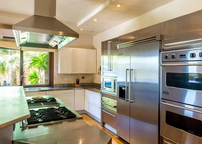 Elegant Mediterranean-style Mansion With Beachfront Views And Private Infinity Pool *